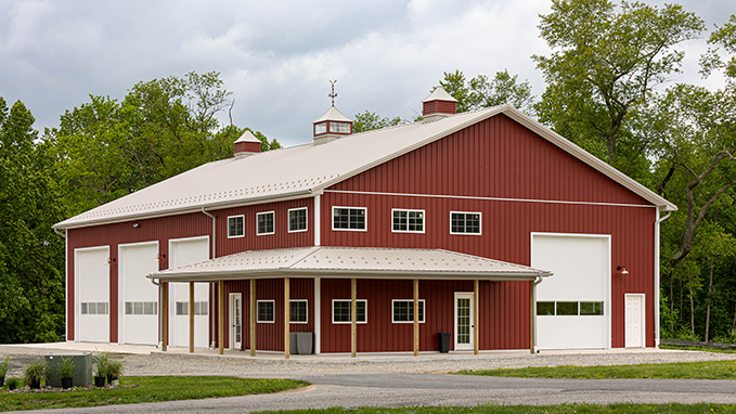 Red pole building with customizations and overhead doors - Wynstride