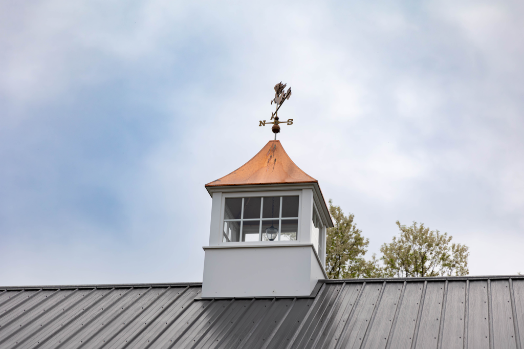 Specialty roof feature on a horse barn